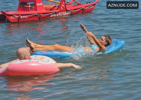 Sophie Monk Sexy In A Blue Bikini While Filming Tv Show With Oscar Gordon On The Beach In