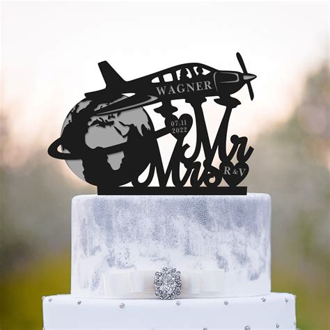 Airplane travel themed wedding cake topper around the world wedding
