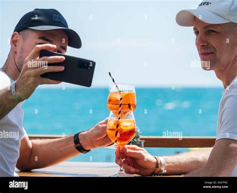 Fuengirola Malaga Spain 03 15 2025 Gay Couple Taking A Selfie With Their Mobile Phone
