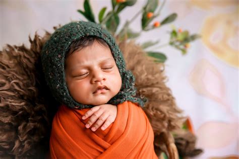 The Adorable Sight of a Baby Owl Sleeping Face Down: A Captivating