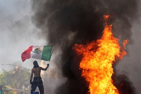 Los Angeles protests: 'Incendiary devices' hurled at police horses