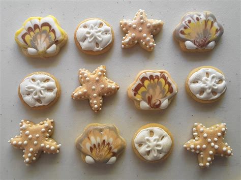 Seashells Tan And White Cookie Charms Seashell Cookies Etsy Sand Dollar Cookies Seashell