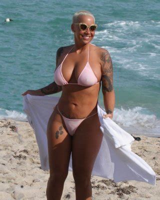 Amber Rose Busty And Booty Wearing String Bikini At The Beach In Miami
