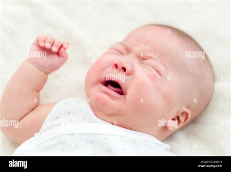 Newborn baby crying Stock Photo - Alamy