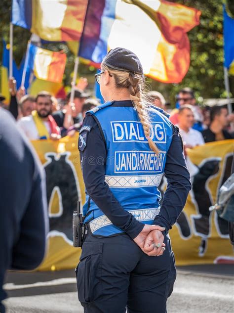 Female Police Officers And Gendarmerie Or Military Police Closely