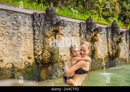Mom And Son Travelers In Hot Springs Banjar Thermal Water Is Released