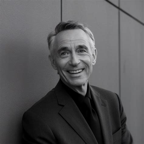 Portrait Of Smiling Mature Man Standing On Gray Background Premium AI