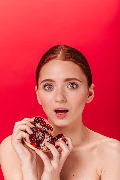 Free Photo Nude Shocked Woman Holding Tasty Garnet Studio Shot Of Adorable Girl With