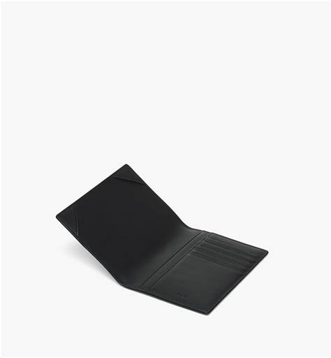 small ottomar passport holder  visetos black mcm