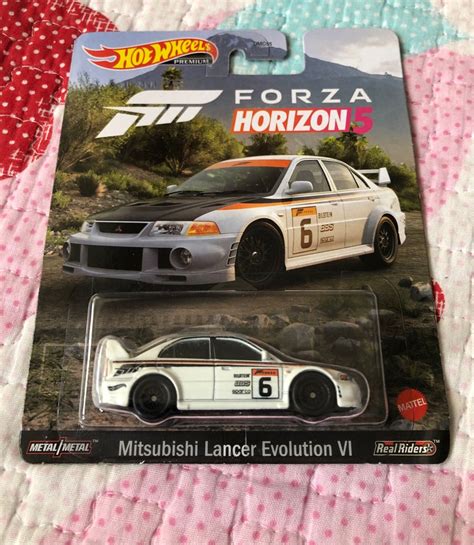 Hotwheels Hot Wheels Mitsubishi Lancer Evolution VI Hobbies Toys Toys Games On Carousell