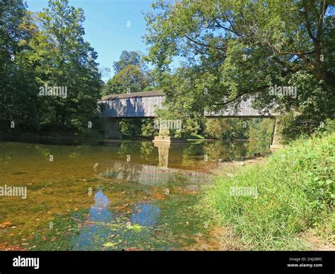 Schofield Ford Covered Bridge,with reflections at Tyler State Park in ...