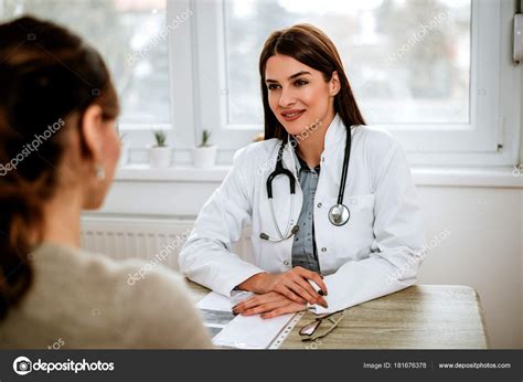 female doctor  patient stock photo  bnenin
