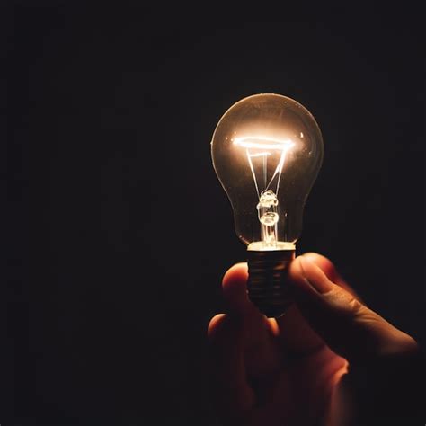 Premium Ai Image Photo A Hand Hold A Light Bulb Innovation Idea