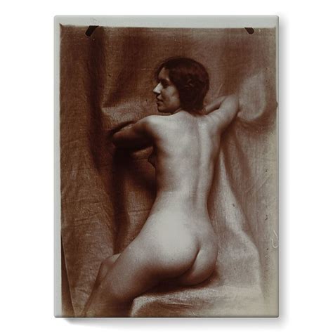 Naked Woman Sitting Three Quarters Back On A Chair Face In Profile