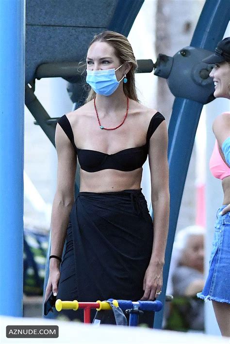 Candice Swanepoel In A Black Bikini Top During A Trip To The Park Aznude