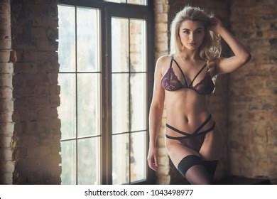 Sexy Blonde Woman Lingerie Stockings Looking Stock Photo Shutterstock