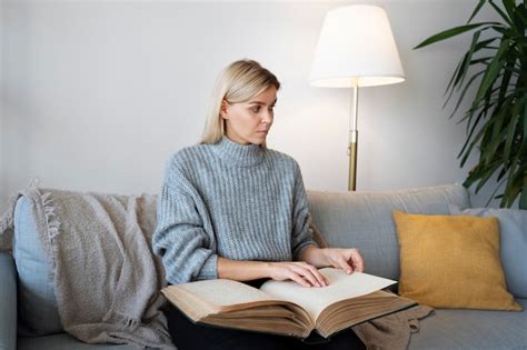 Free Photo | Blind person reading at home