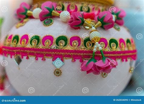 Close Up Shot Of Clay Pot Decorated With Flowers And Gems For Indian