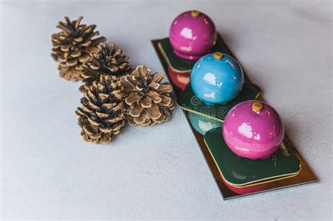 Front View Of Blonde Cheerleader In Cheerleaders Uniform Sitting On Basketball Court Posing With