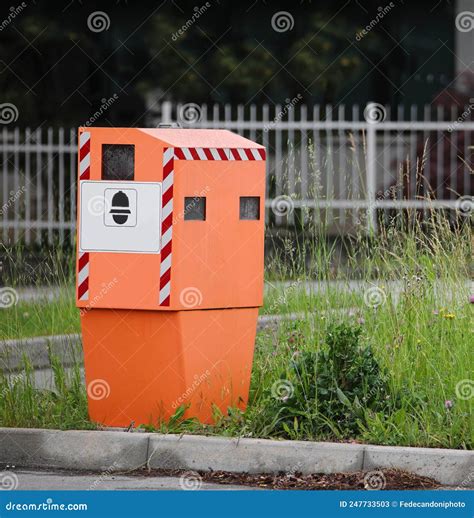 Traffic Enforcement Camera on the Road with Symbol of Police Stock