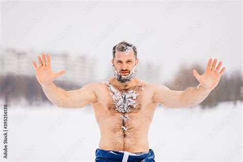 Strong Brutal Naked Man With Beard In The Snow Posing Outdoors Stock Photo Adobe Stock