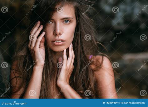 Close Up Portrait Of Beautiful Brunette Girl With Long Hair And Nude Make Up Stock Image Image
