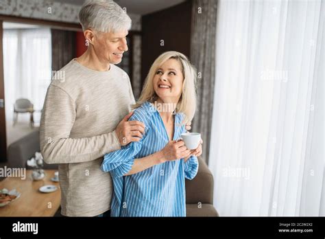 Adult Love Couple Drinks Red Wine At Home Mature Husband And Wife Have Romantic Dinner Happy