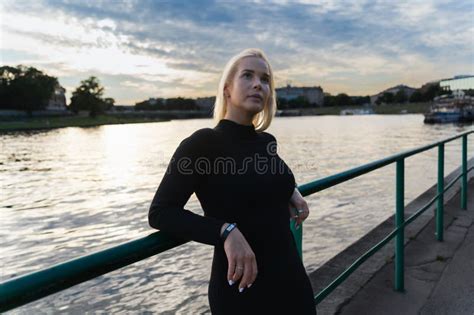 Beautiful Blonde Girl Posing On The Promenade In Krakow At Sunset Stock Image Image Of Healthy