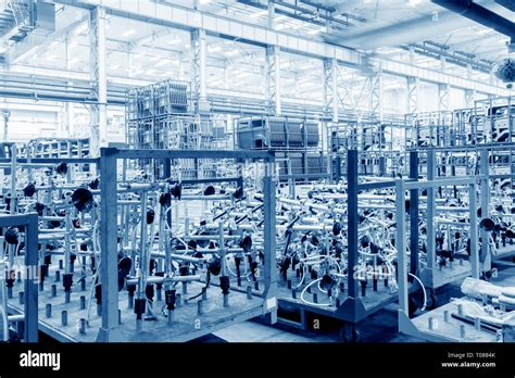 The interior of a big industrial building or factory with steel ...