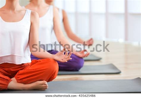 Barefoot Women Practicing Yoga Stock Photo (Edit Now) 435625486