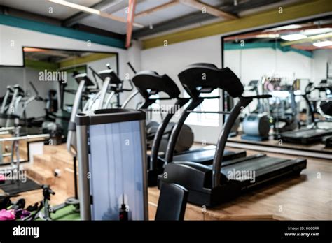 View of empty gym equipment Stock Photo - Alamy