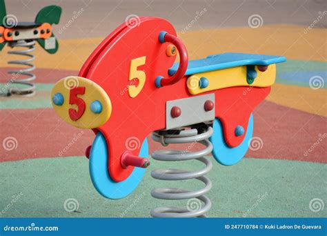 Detail of Some of the Swings for Children in a Playground Stock Photo ...