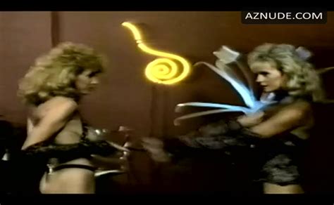 Lisa London Breasts Scene In The Naked Cage Aznude