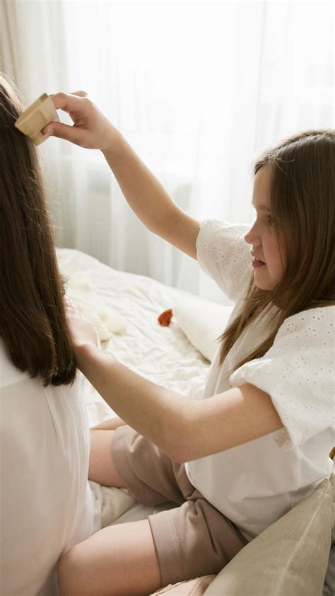 combing hair      combing hair stock