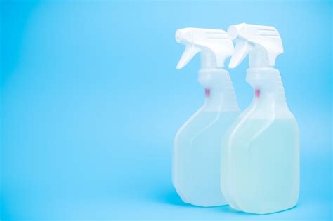 Premium Photo Two Bottles Of Disinfectant Sprayer