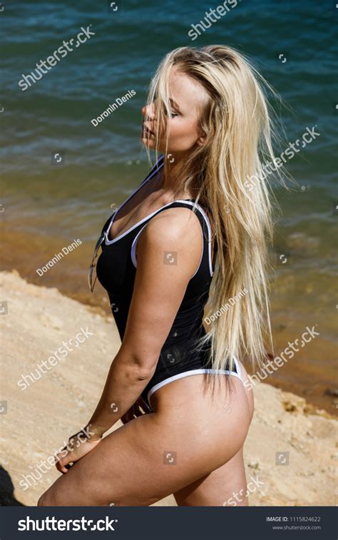 Beautiful Sexy Blonde Girl Swimsuit Posing Foto Stok 1115824622