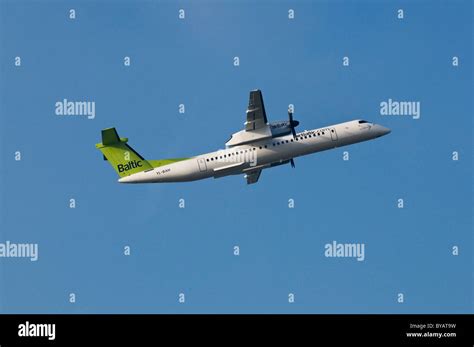 Baltic Air De Havilland Canada Propeller Aircraft Climbing Stock Photo