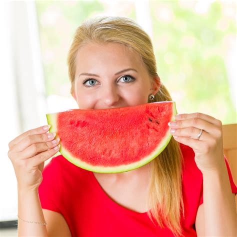 woman eating watermelon  stock photo public domain pictures