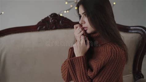 Portrait Of Pretty Brunette With Long Hair Caresses To Her Sweater Stock Video Video Of