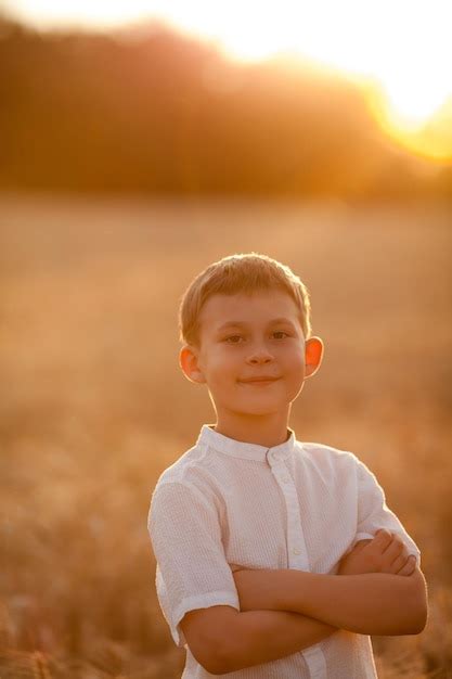 Premium Photo Adorable Little Blonde Boy 8 Years Old In The Sun At