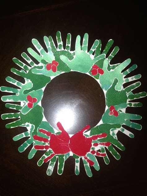 Handprint Wreath | Christmas arts and crafts, Christmas activities ...