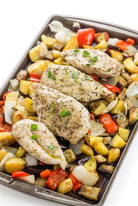 sheet pan greek chicken  vegetables  lemon bowl