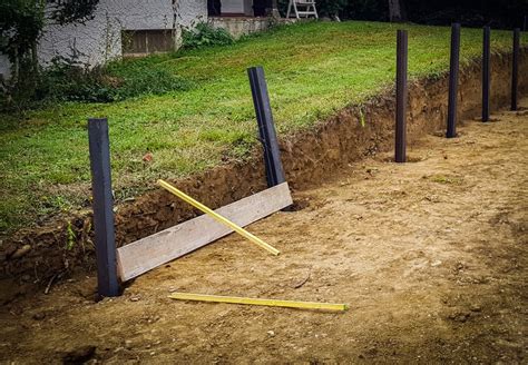 Comment construire un mur de soutènement en bois