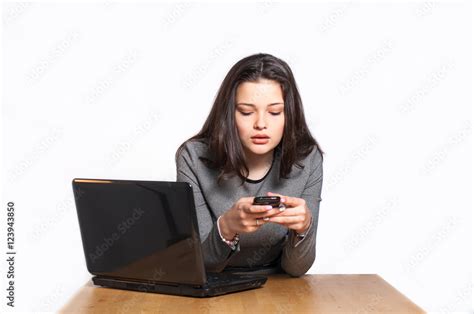 Девушка за столом Stock Photo | Adobe Stock