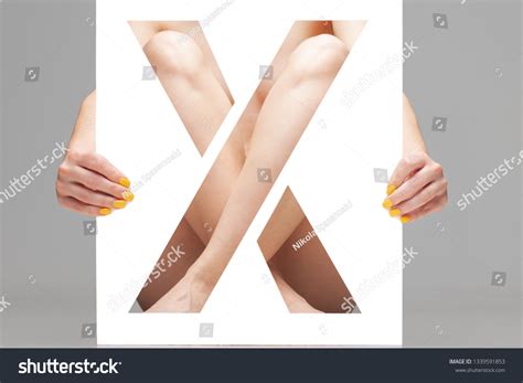 Nude Female Body Behind Stencil Letter Stock Photo Shutterstock