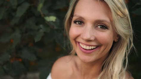Portrait Of A Smiling Blonde Girl With White Teeth Stock Video At Vecteezy