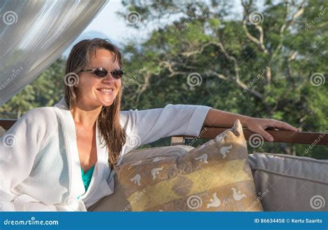 Woman Lounging Seductively Posing In Lacey Pink Lingerie Royalty Free Stock Photography