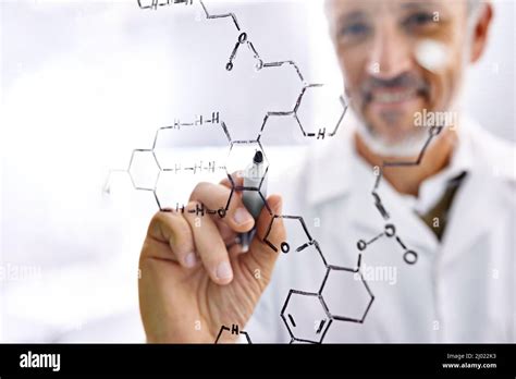 Chemistry Makes Him Happy Shot Of A Mature Male Scientist Working With
