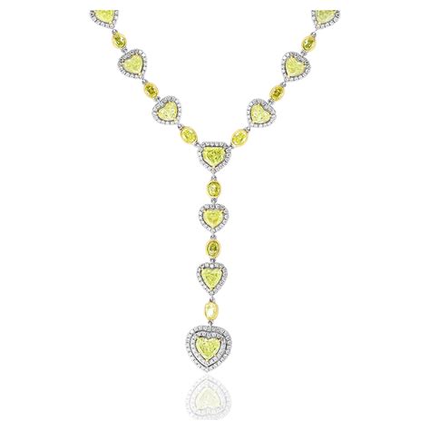 carats mixed shape fancy yellow diamond necklace    tone