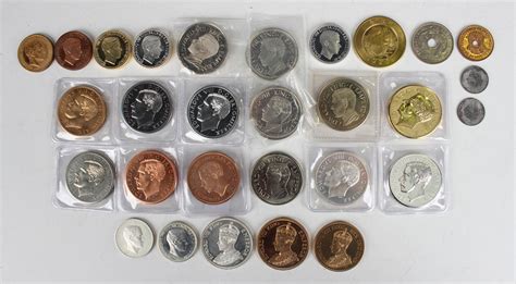 A Collection Of Edward Viii Pattern Fantasy Coins Including A Silver